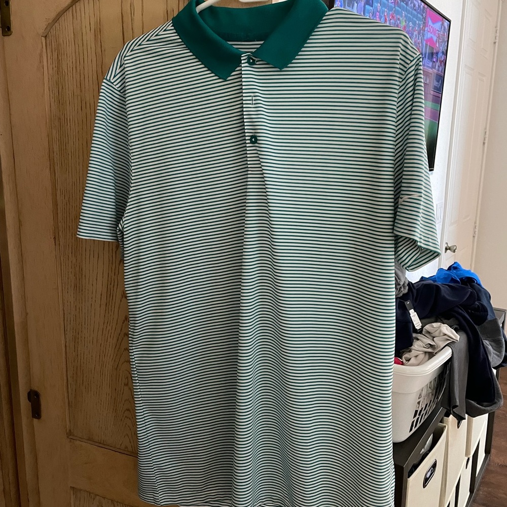 Nike golf shirt.